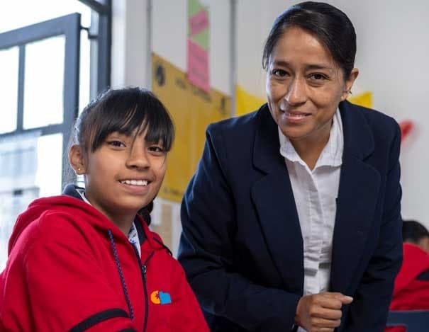 A teacher and a student at Christel House Mexico