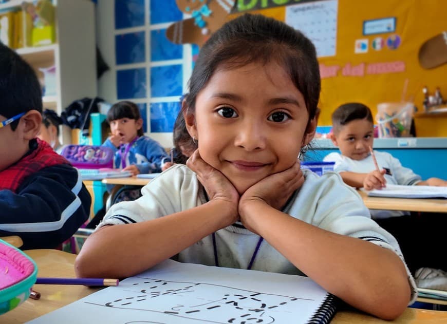 A student at a desk at Christel House Mexico