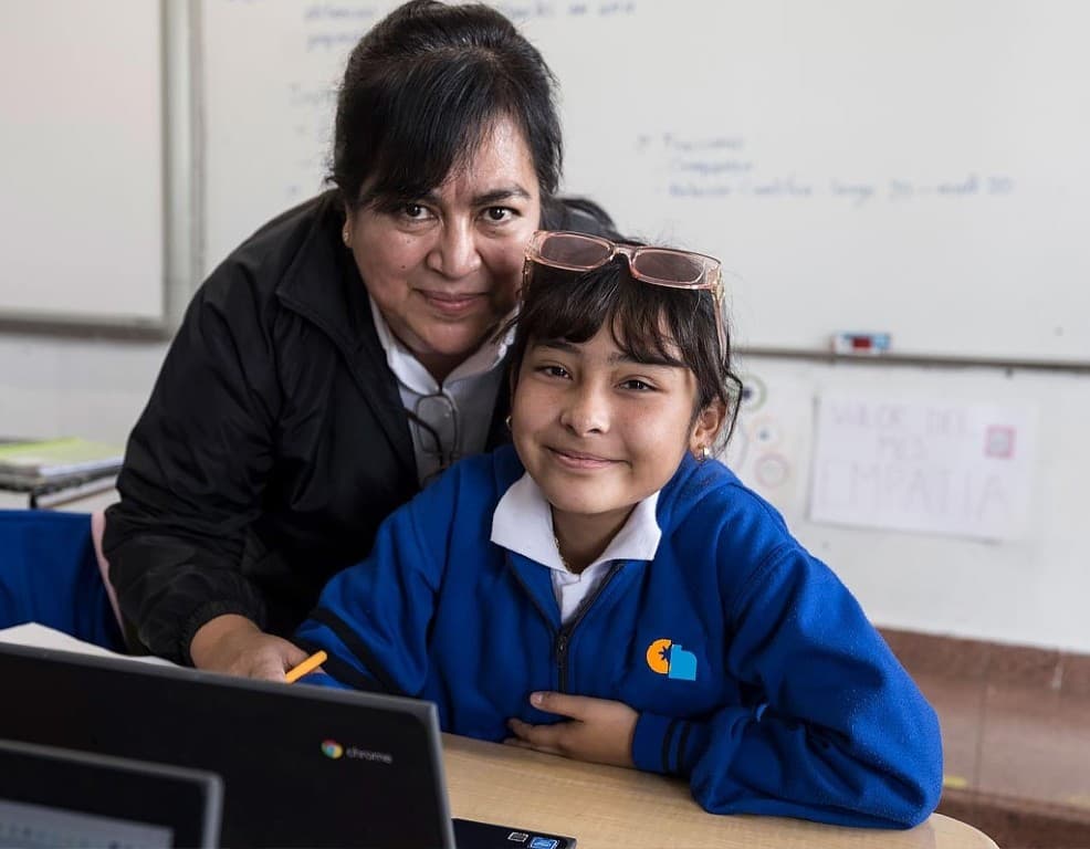 A teacher and a student at Christel House Mexico