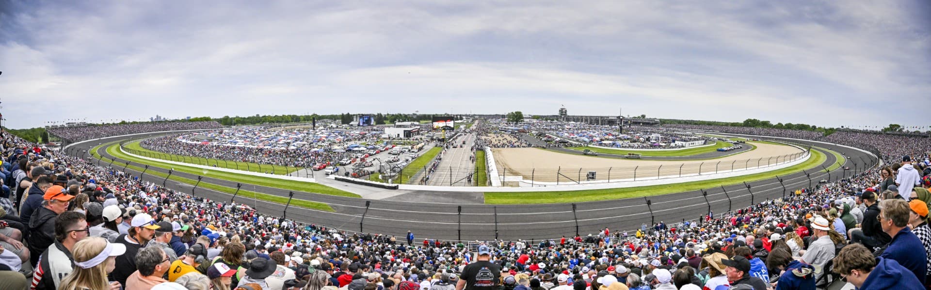 Wide angle shot of the filled grandstands at the Indianapolis 500